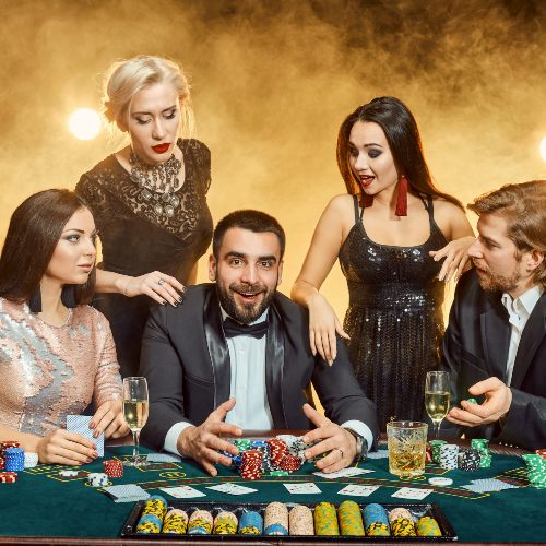 Poker players sitting around a table
